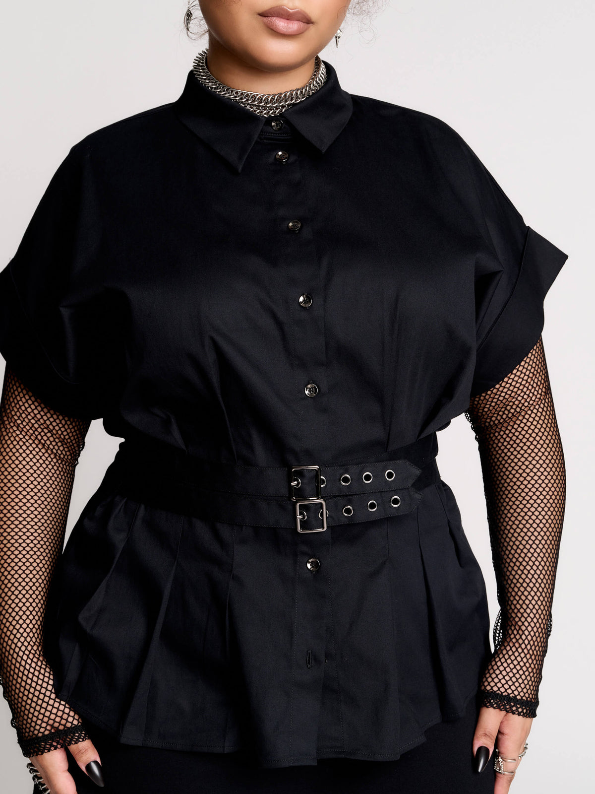a black short-sleeve button-front shirt dress with a matching double-buckle front waist details.