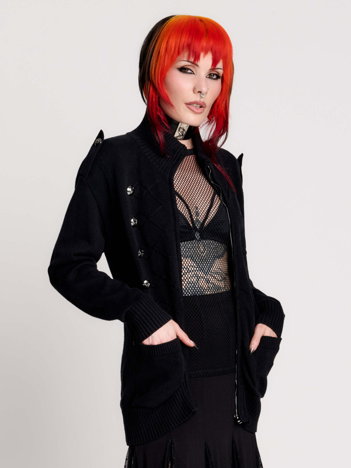 black zip-up knitted cardigan with ilver tones buttons and pockets