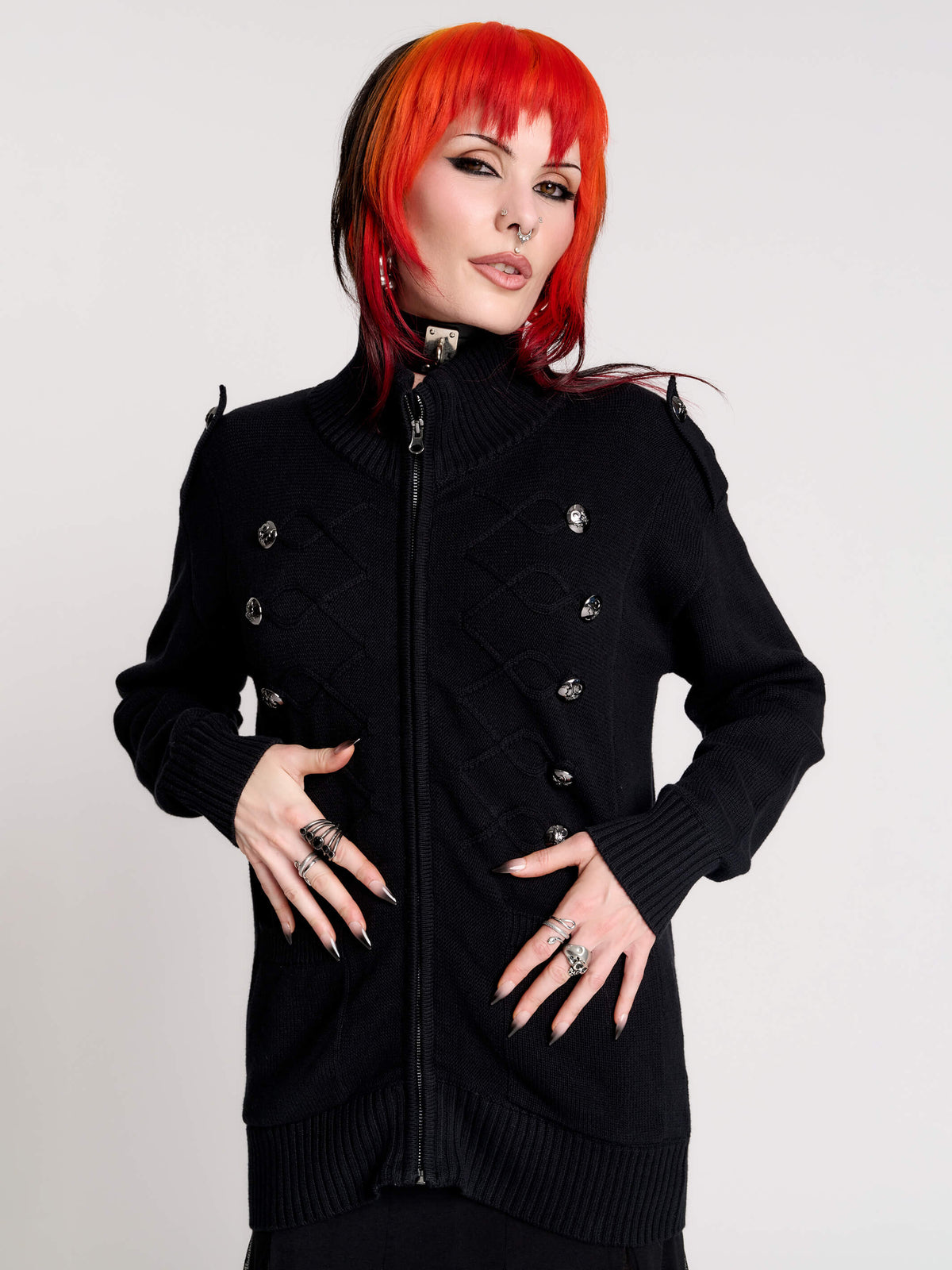 black zip-up knitted cardigan with ilver tones buttons and pockets