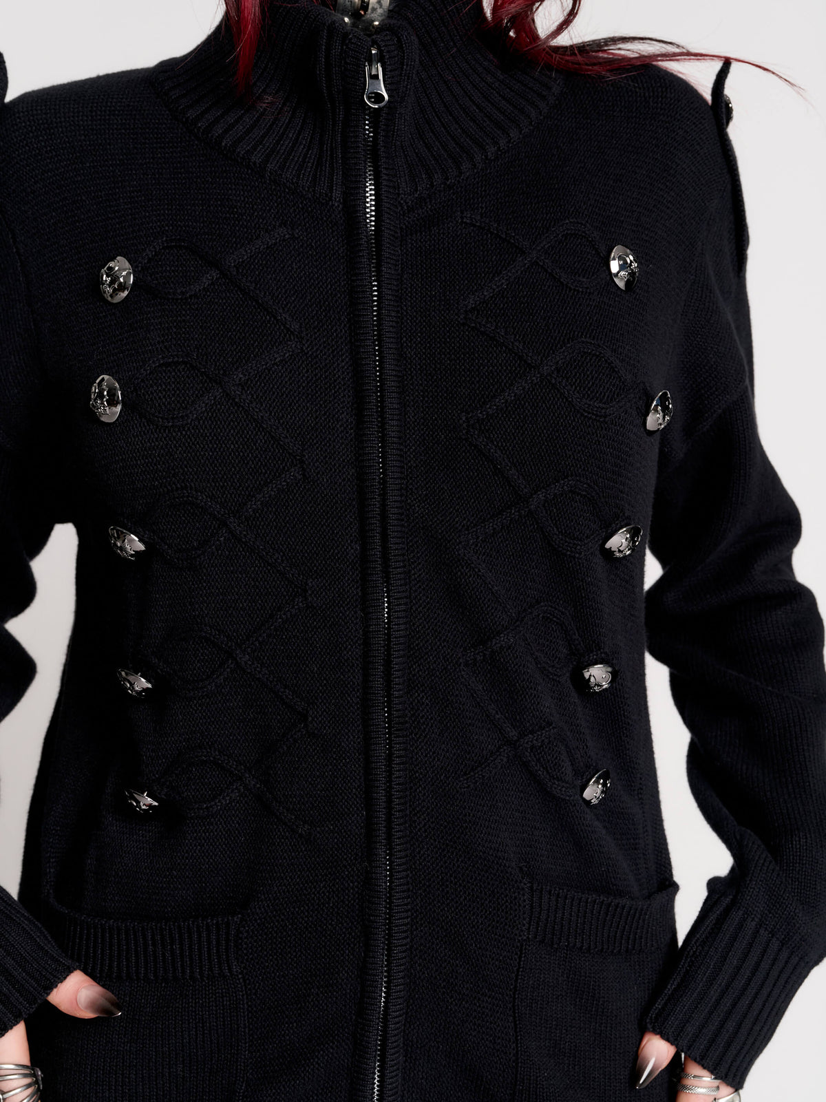 black zip-up knitted cardigan with ilver tones buttons and pockets