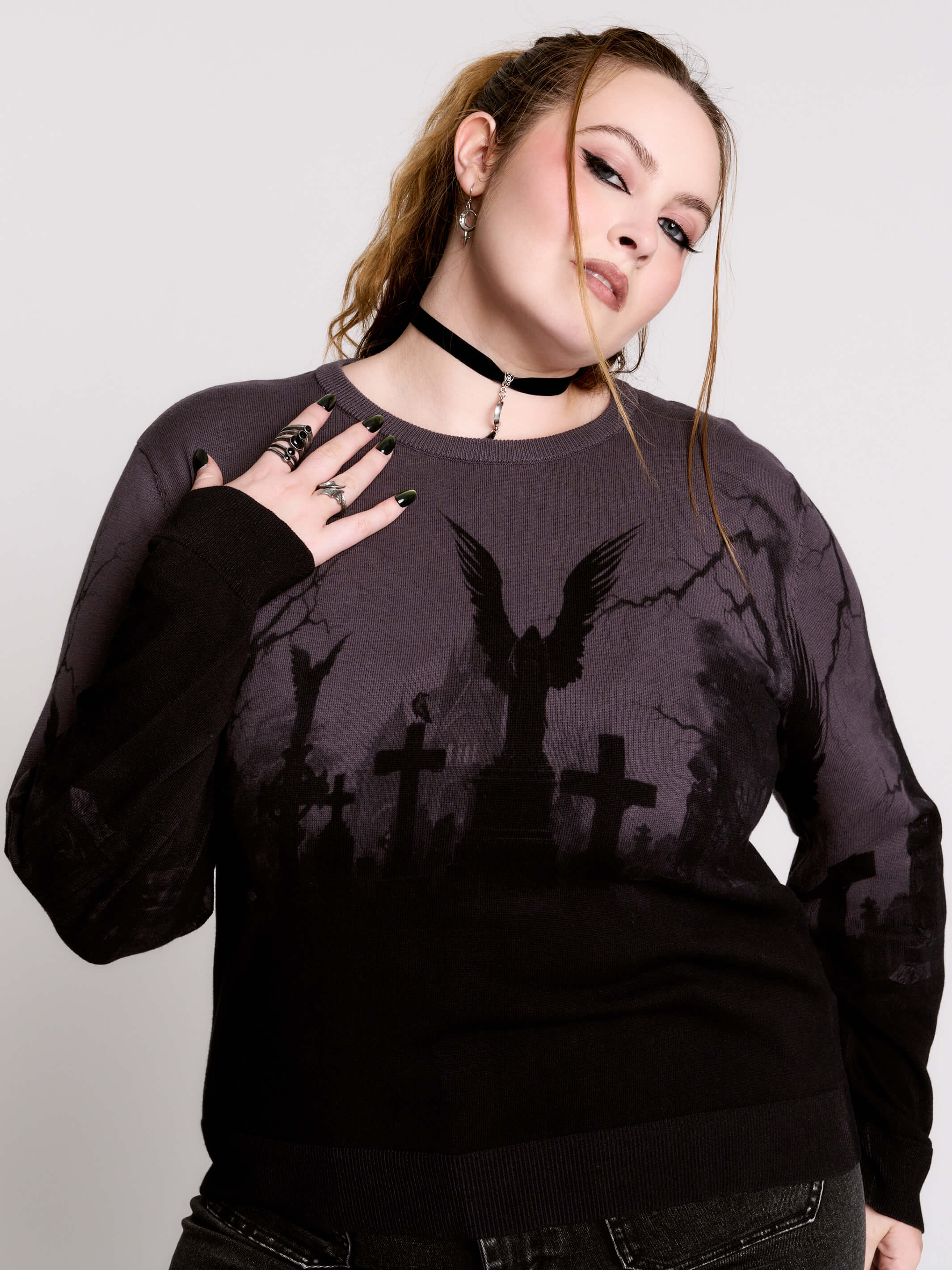cemetery silhouette and a winged angel statue—spans the chest and sleeves, with a moody light charcoal ombré fade into deep black.