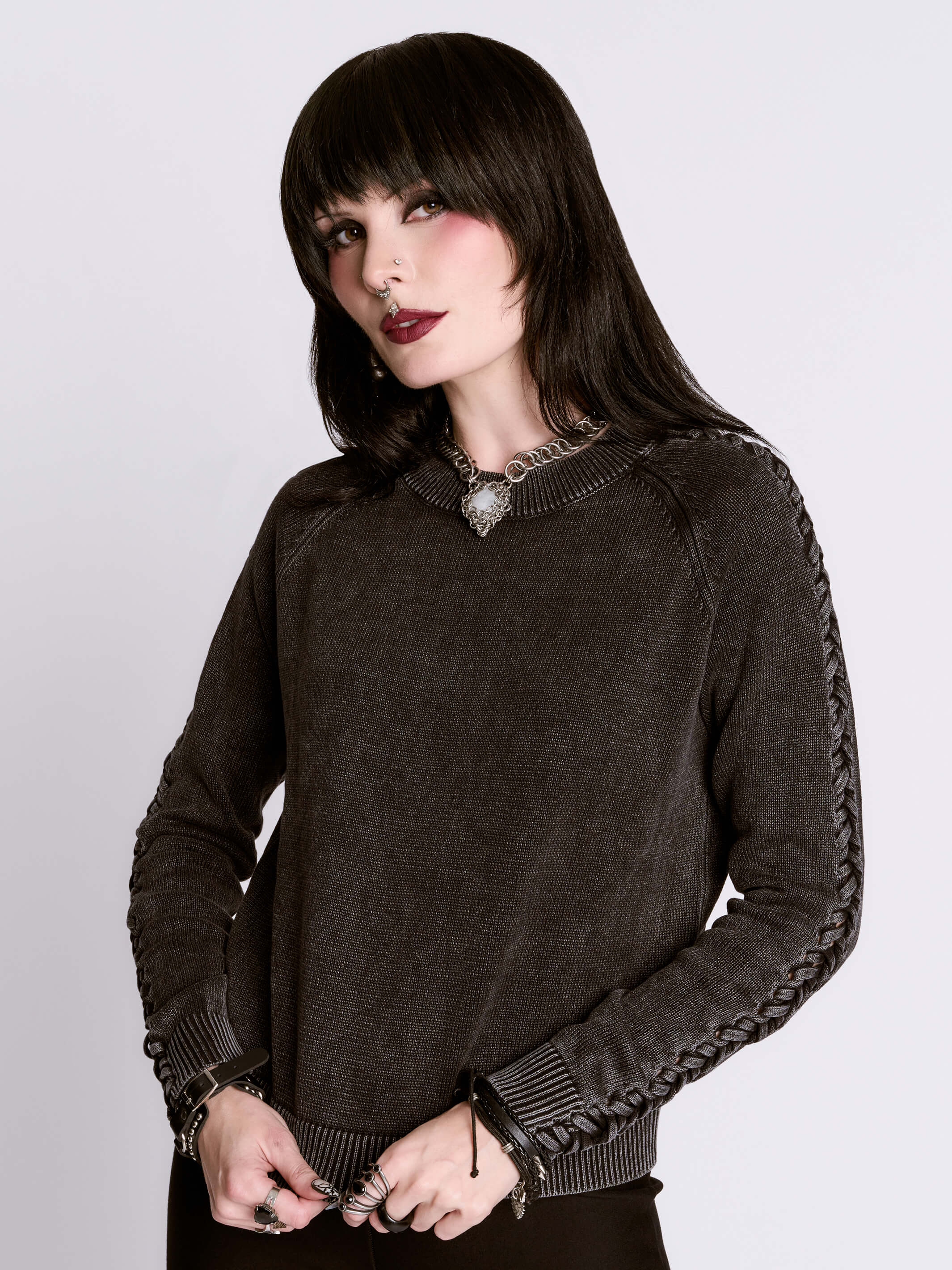 distressed braided sweater