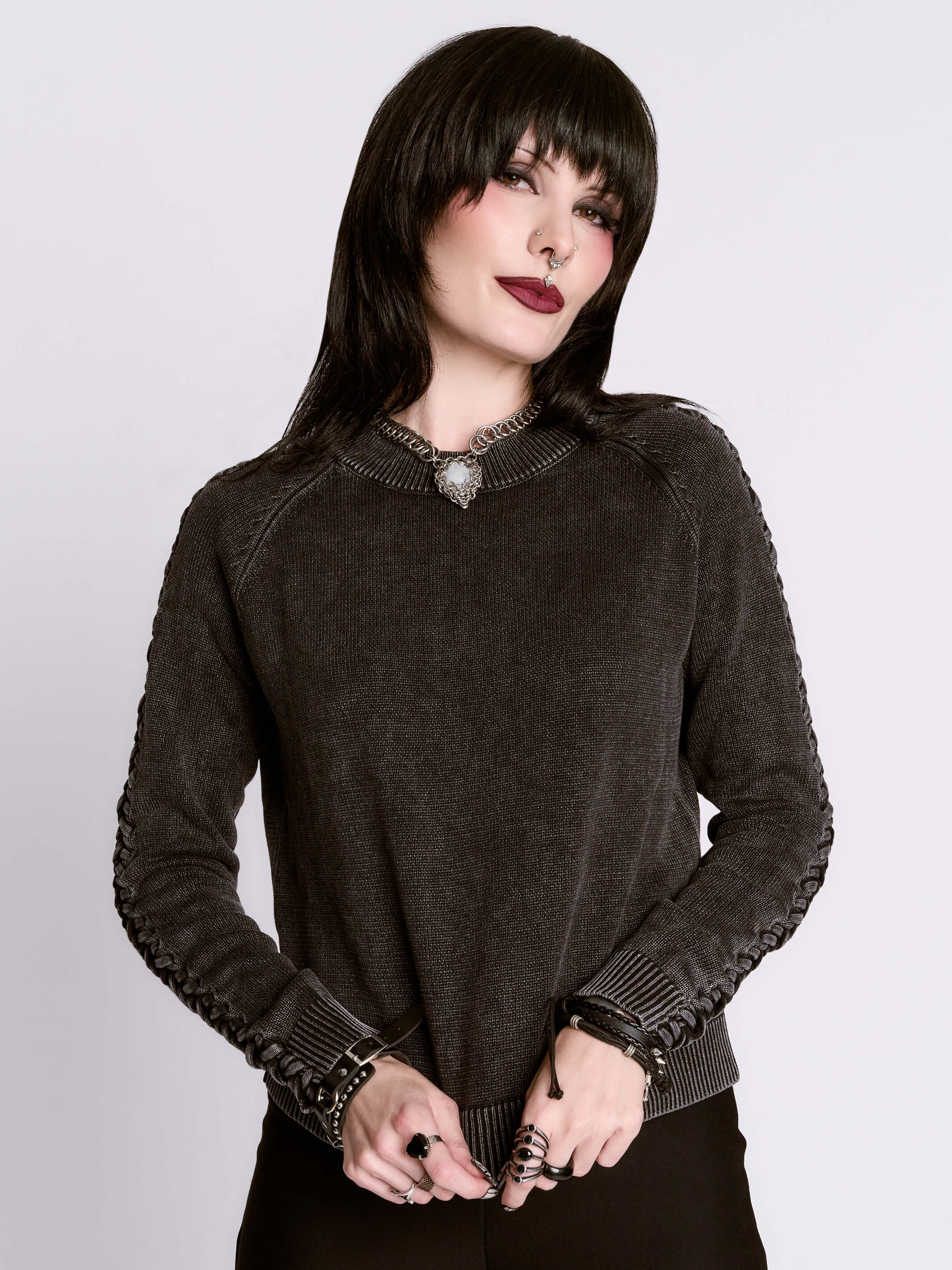 distressed braided sweater