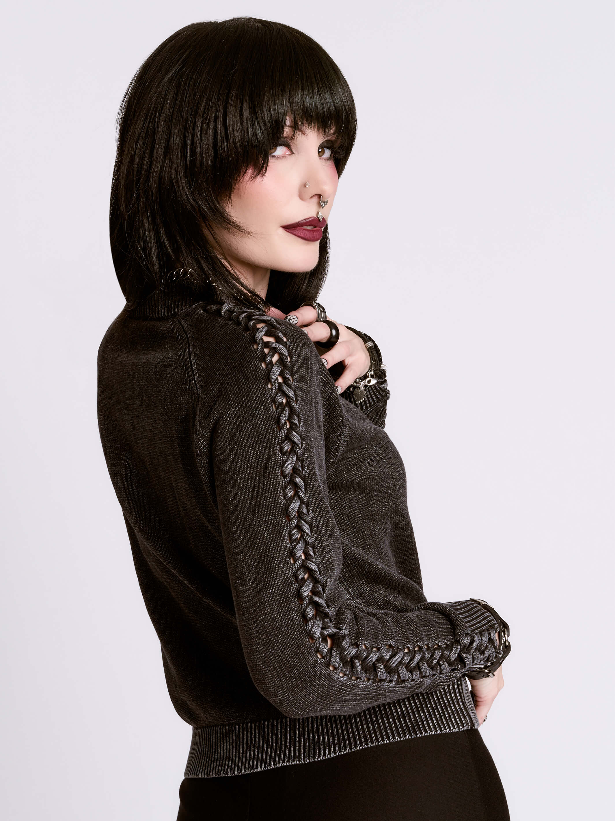 distressed braided sweater