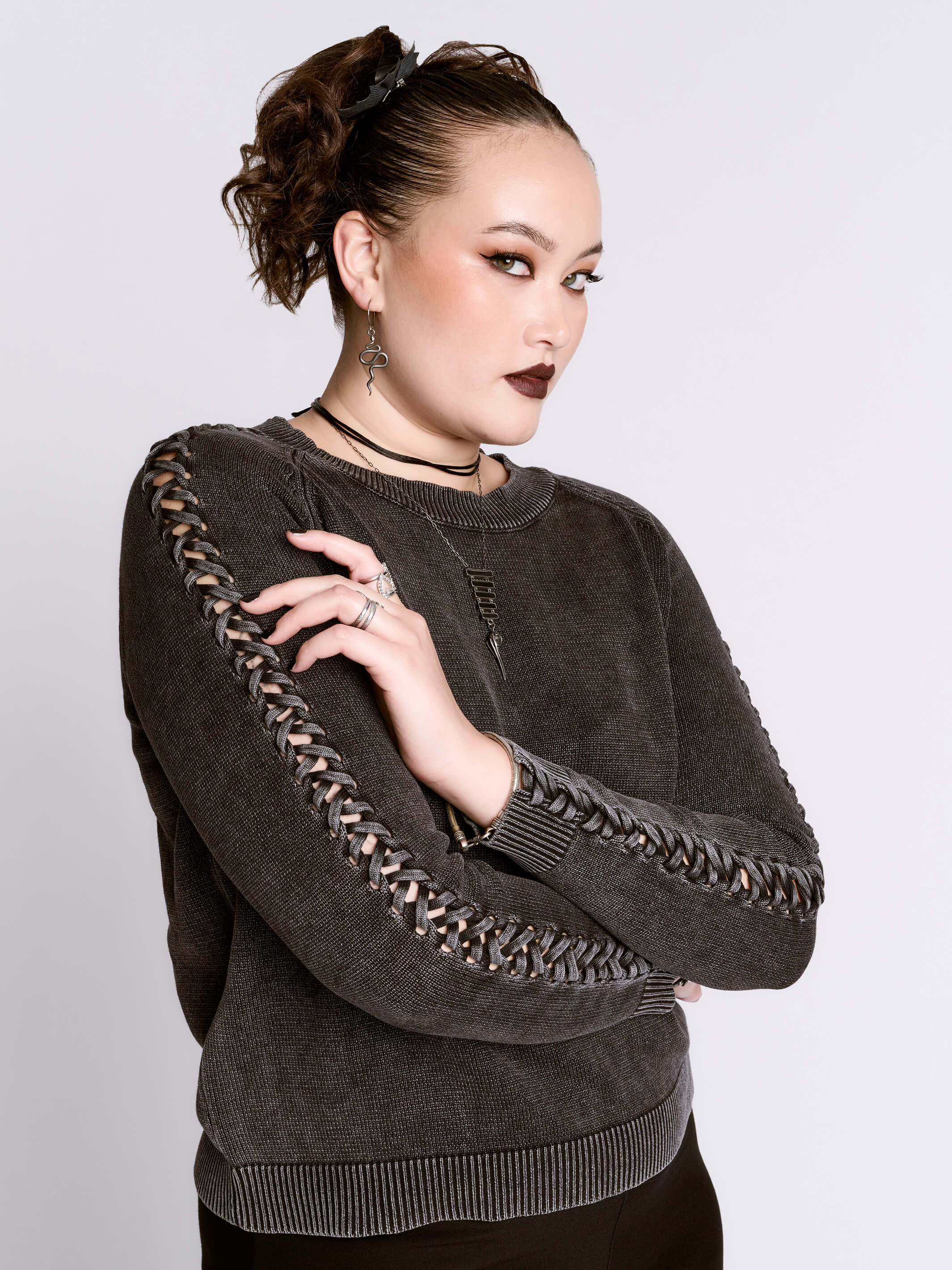 distressed braided sweater
