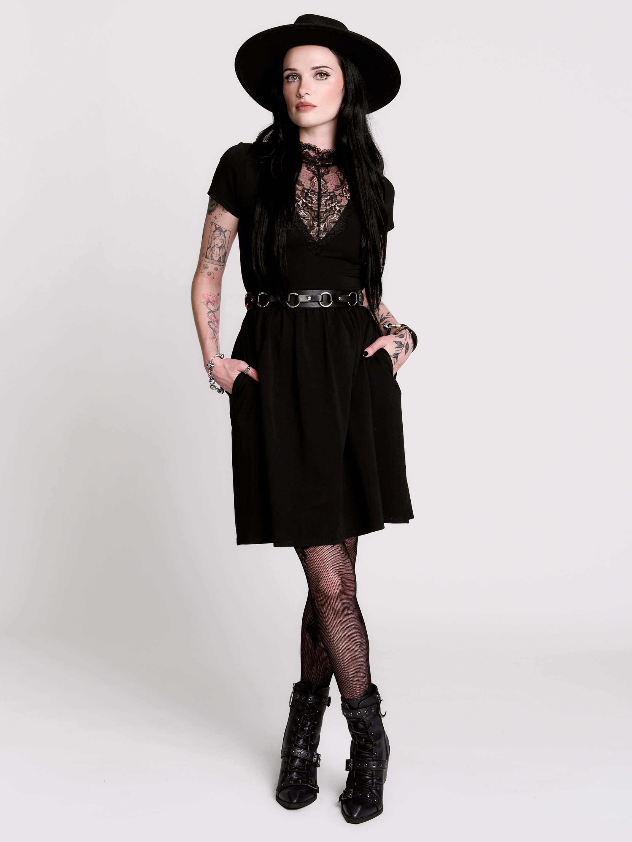 A black short-sleeve dress with a lace V-neckline.