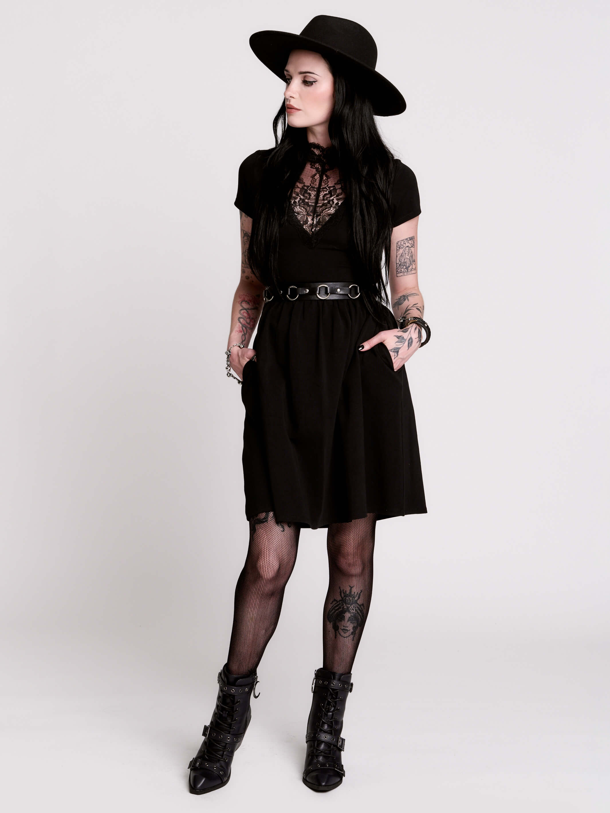 A black short-sleeve dress with a lace V-neckline.
