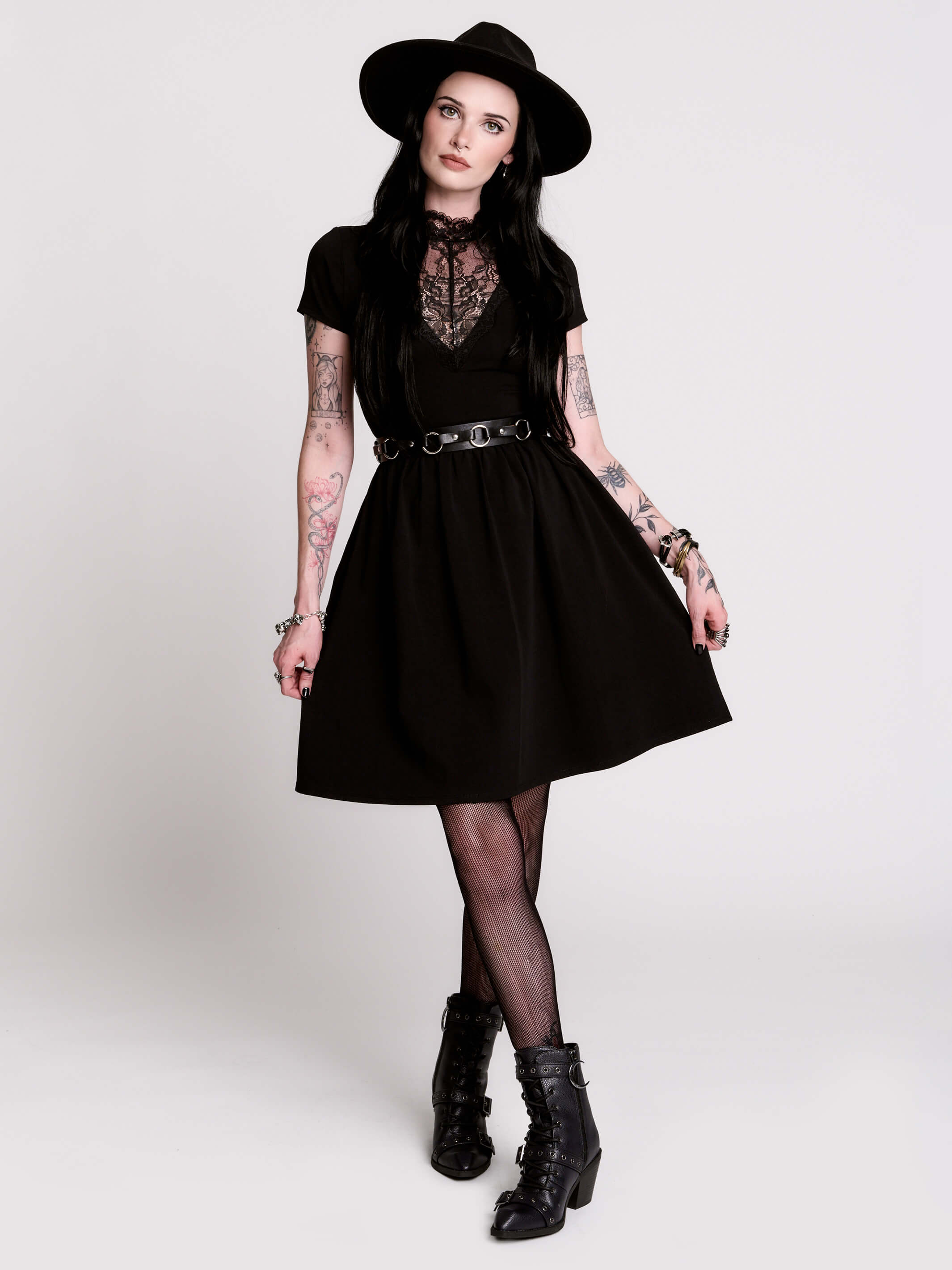 A black short-sleeve dress with a lace V-neckline.