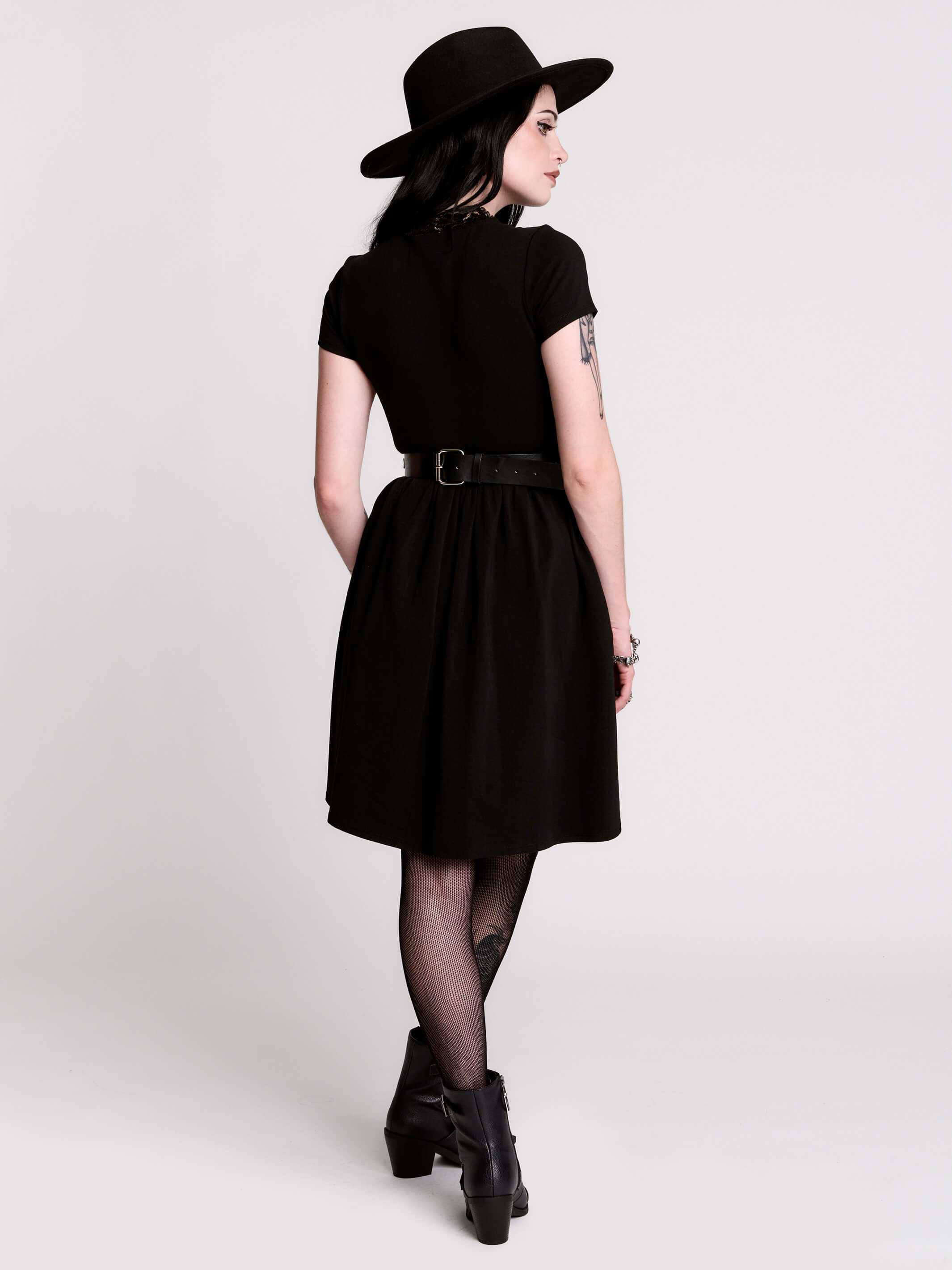 A black short-sleeve dress with a lace V-neckline.
