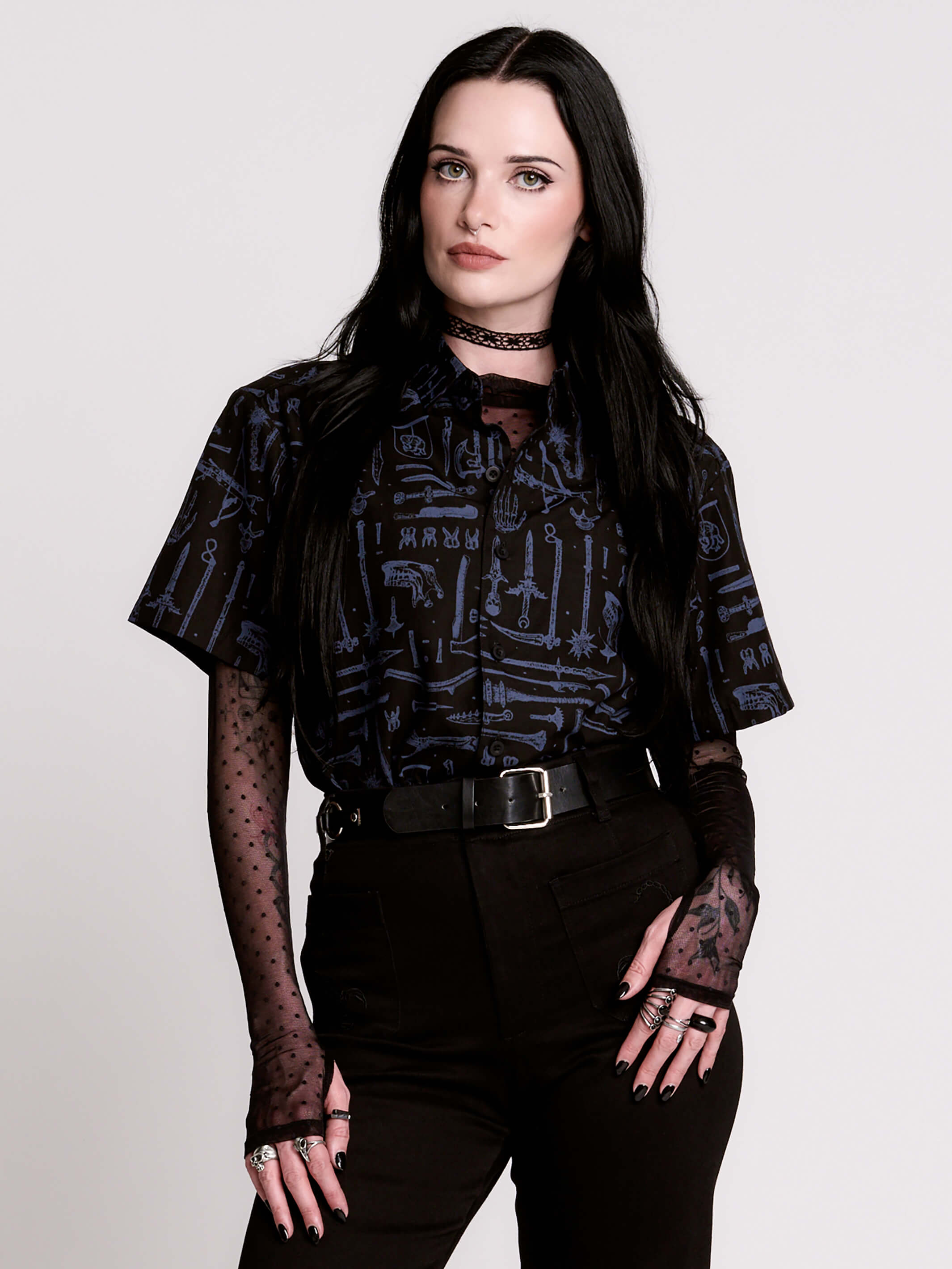 short-sleeve button-down that mixes crisp classic shirting with dark, gothic illustration.