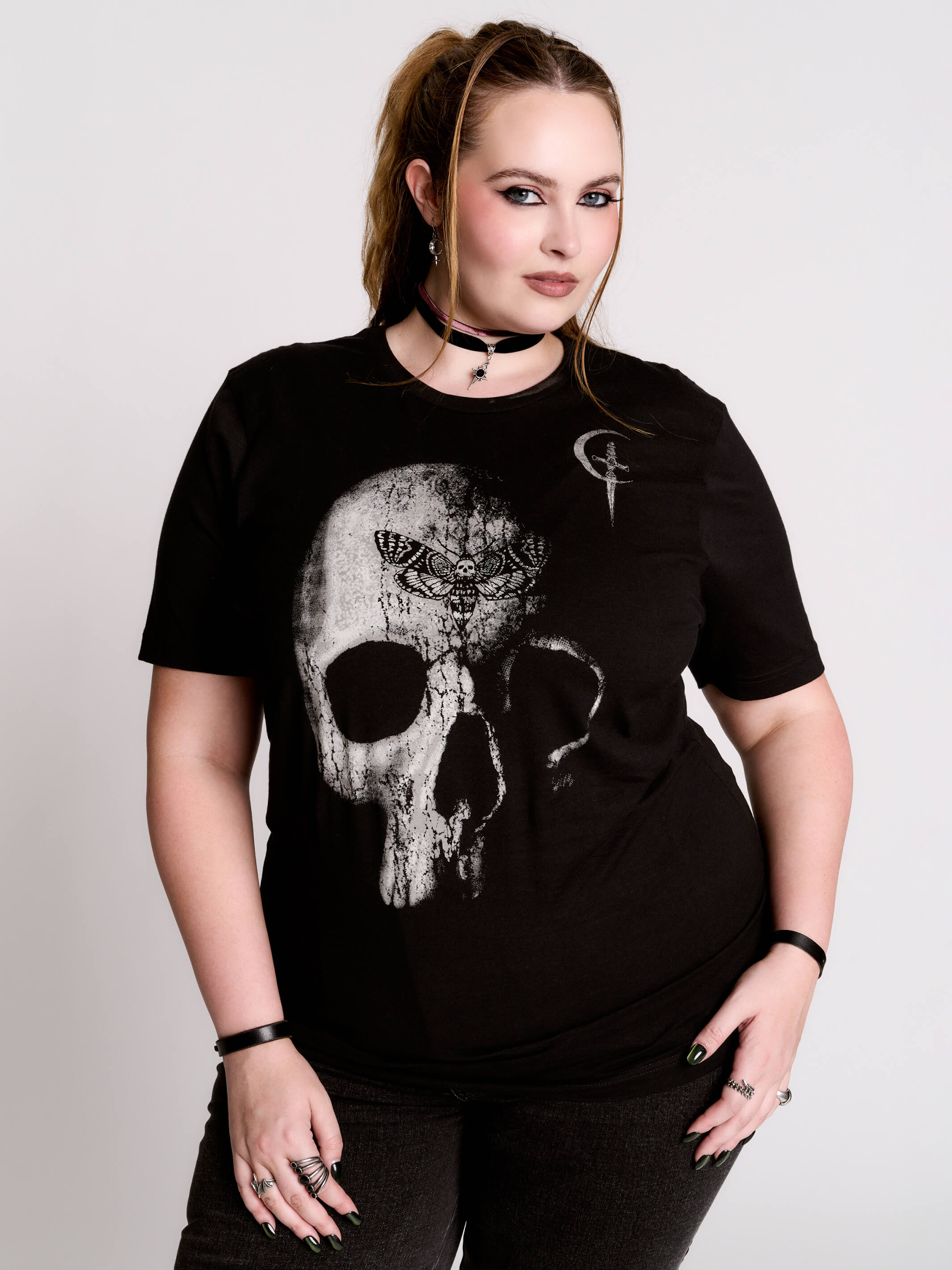 A black t-shirt with a large white skull graphic on the front.