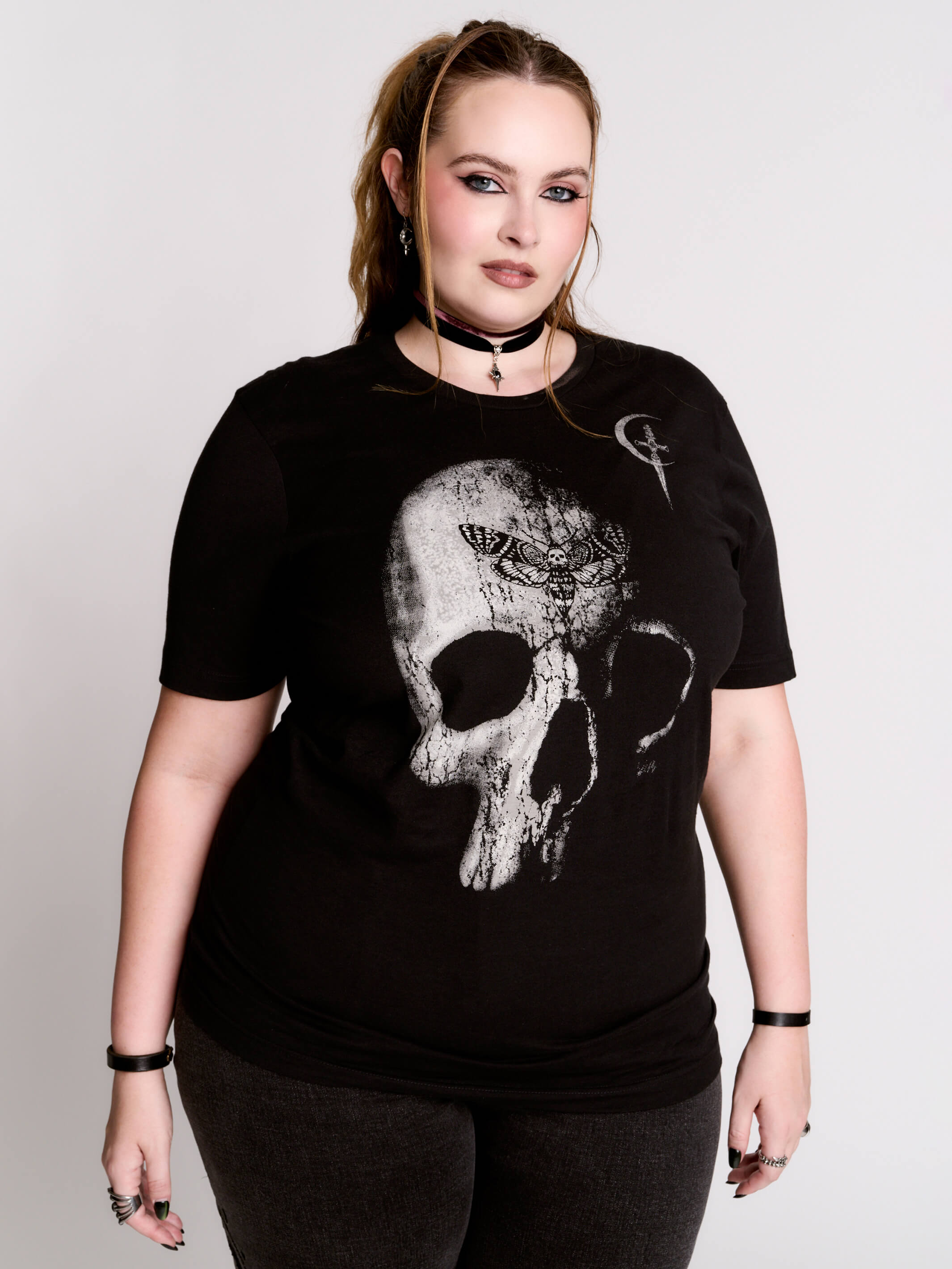A black t-shirt with a large white skull graphic on the front.