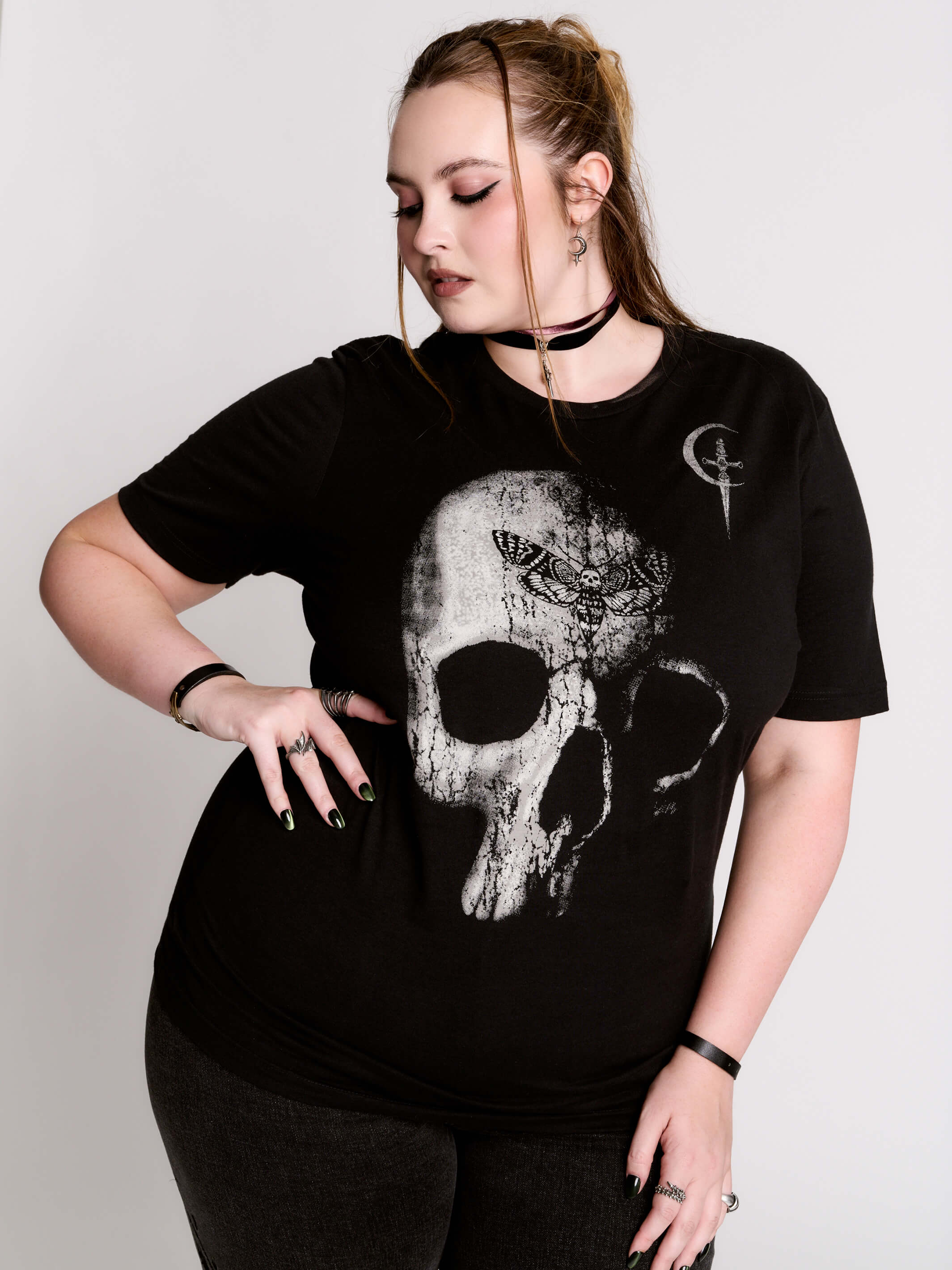 A black t-shirt with a large white skull graphic on the front.