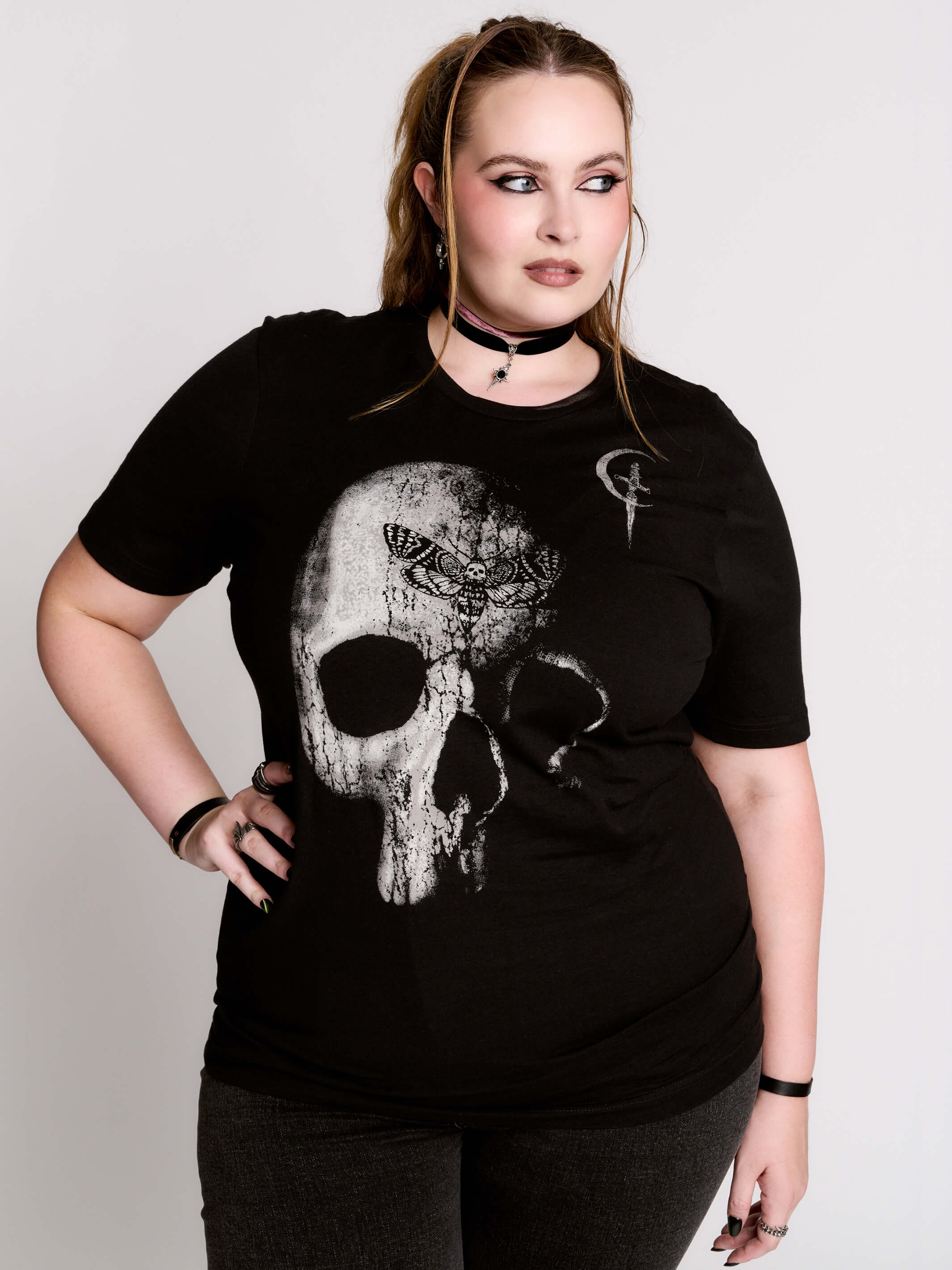 A black t-shirt with a large white skull graphic on the front.