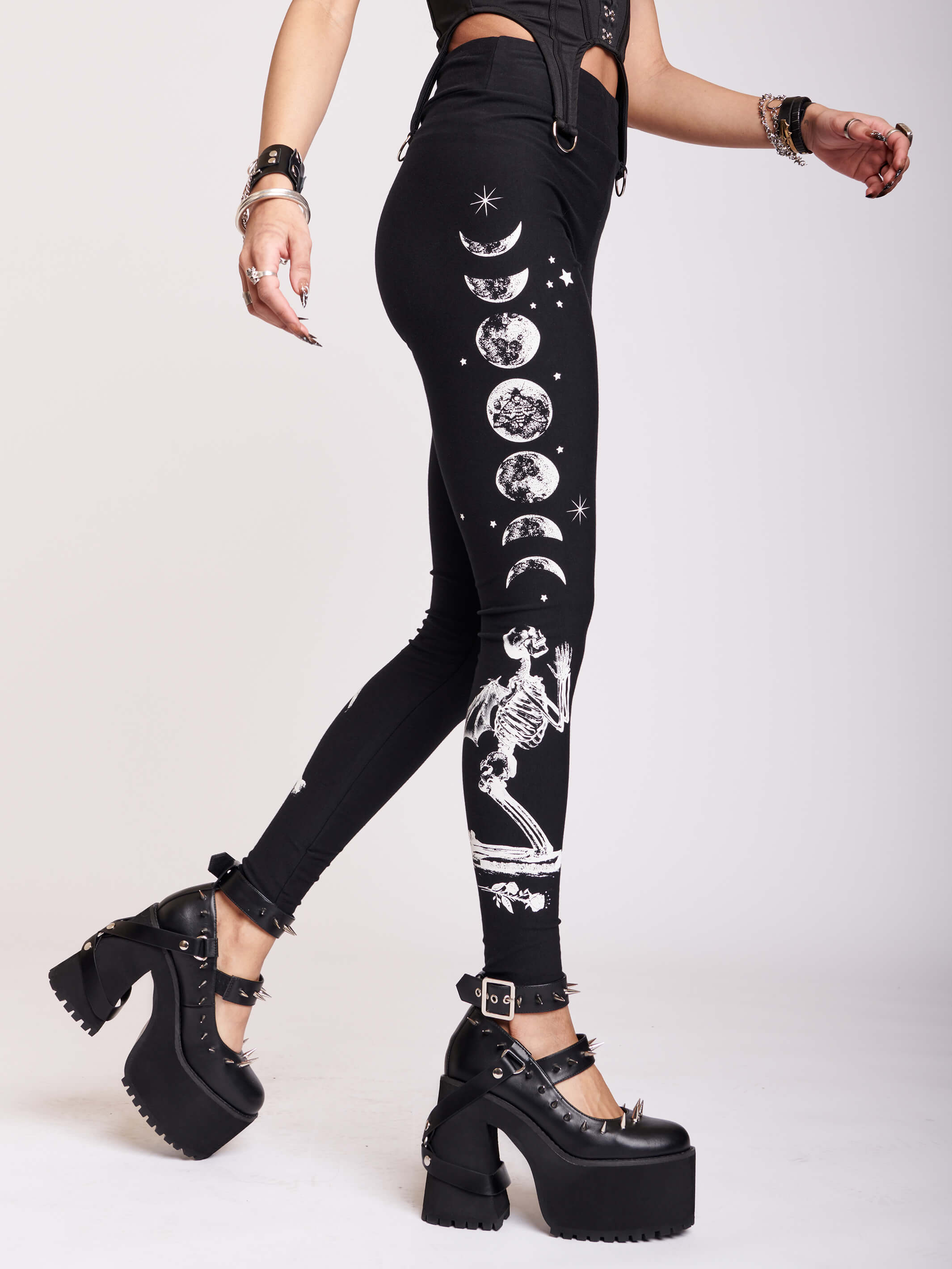 BLACK LEGGING WITH WHITE GRAPHIC FEATURING PRAYING SKELTON AND MOON PHASE