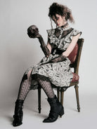 Edward Gorey Victorian dress