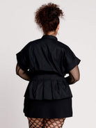 a black short-sleeve button-front shirt dress with a matching double-buckle front waist details.