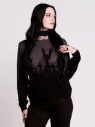 cemetery silhouette and a winged angel statue—spans the chest and sleeves, with a moody light charcoal ombré fade into deep black. 