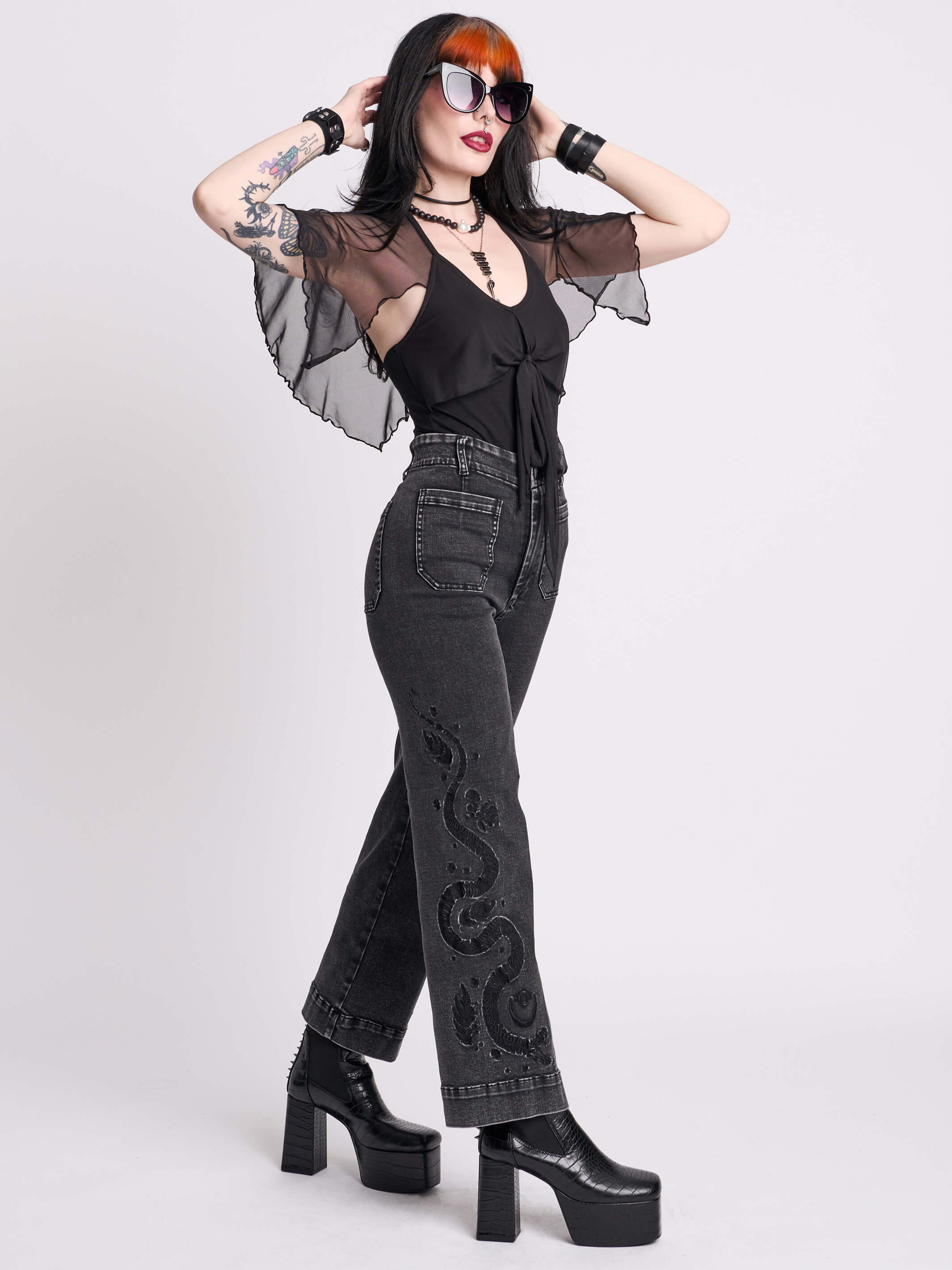 EMBROIDERED DISTRESSED DENIM