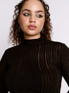 Distressed striped drop needle sweater