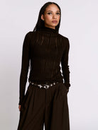 Distressed striped drop needle sweater