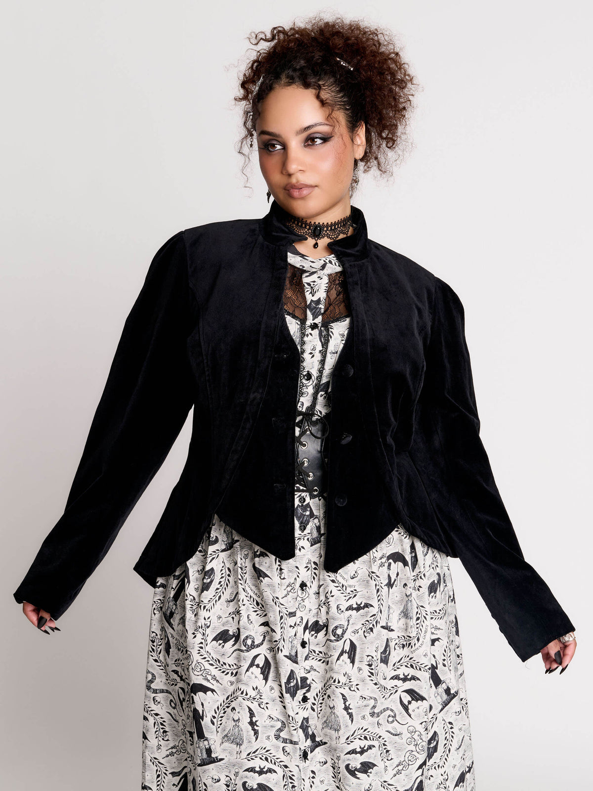 black velvet jacket with a black-and-white patterned lining