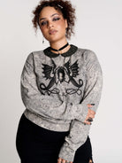 gray marled long-sleeve shirt with a black dragon graphic and a printed Peter Pan collar