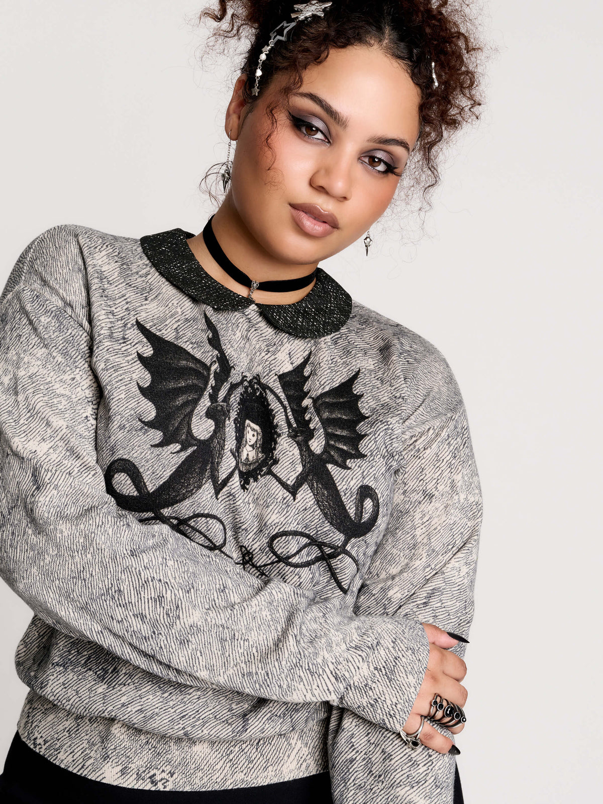 gray marled long-sleeve shirt with a black dragon graphic and a printed Peter Pan collar