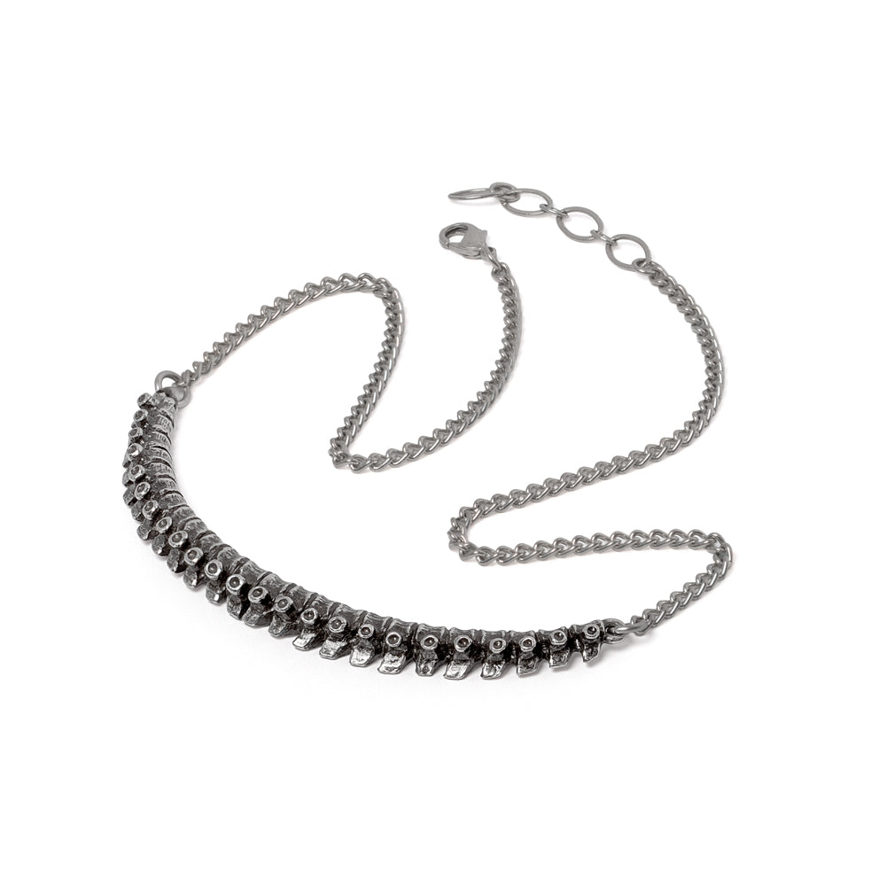Inspired by the human skeleton the spine necklace drapes naturally across the neckline.