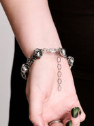 Skull and barbed wire bracelet