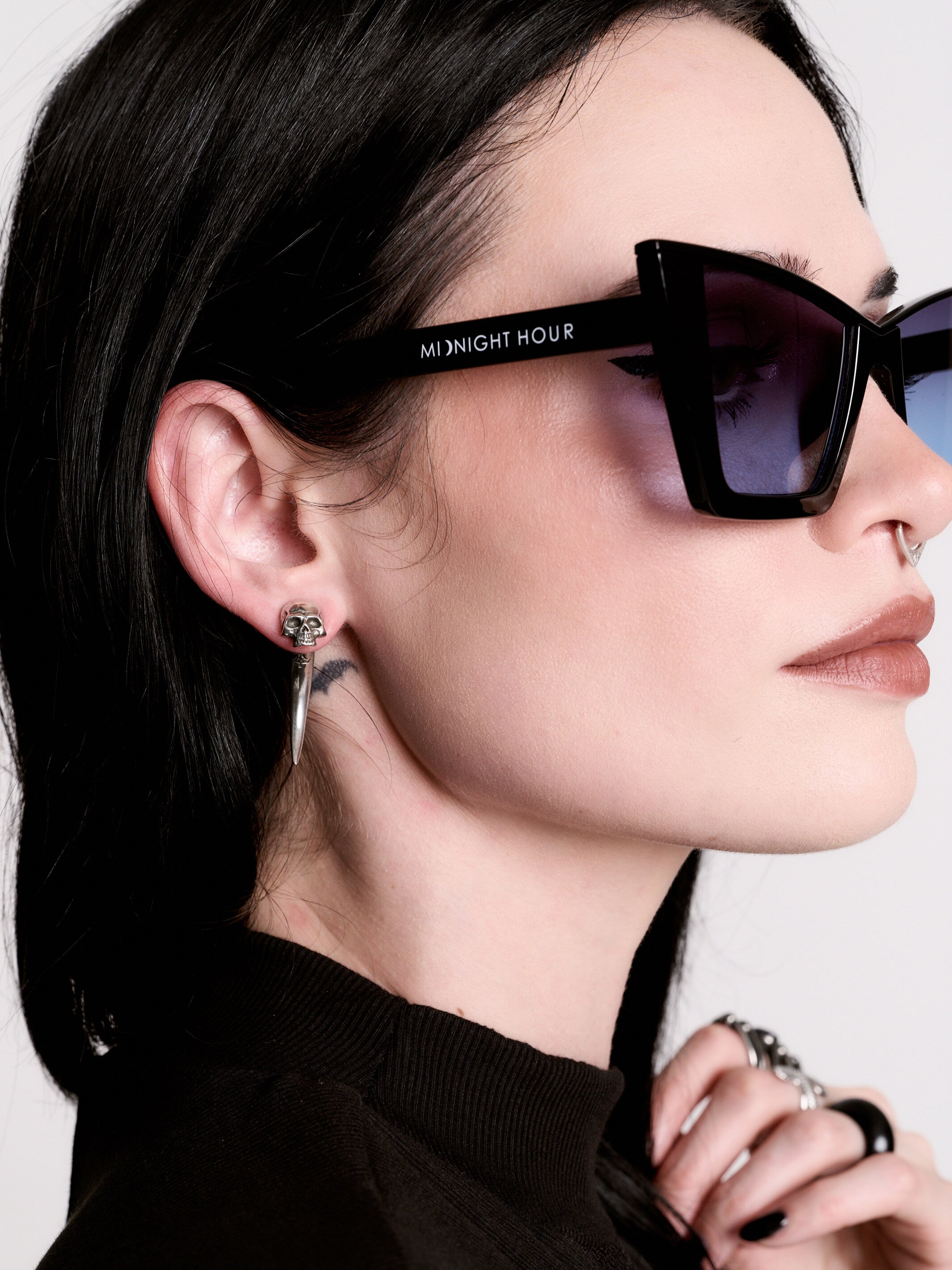 Skull horn earring