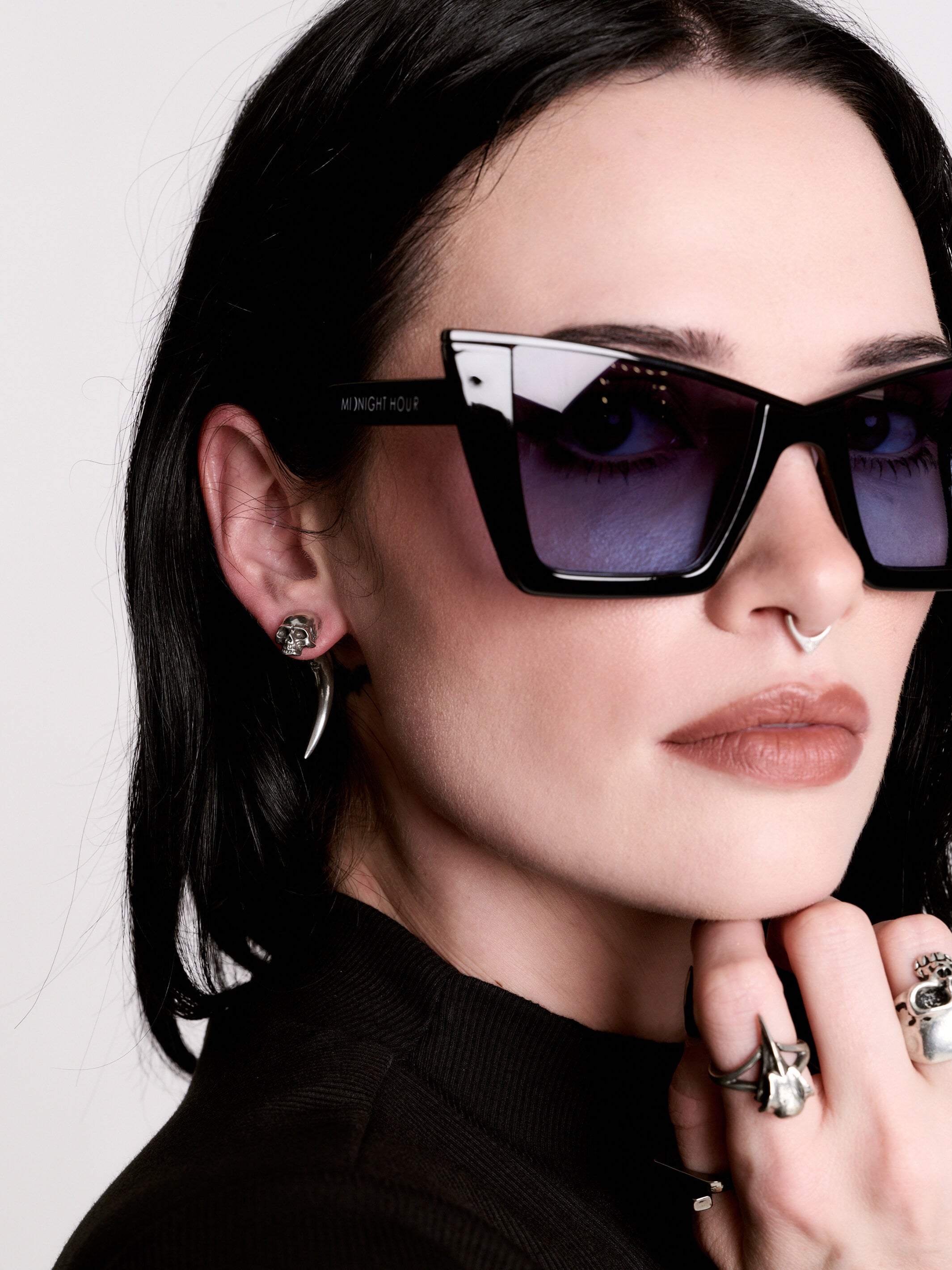 Skull horn earring