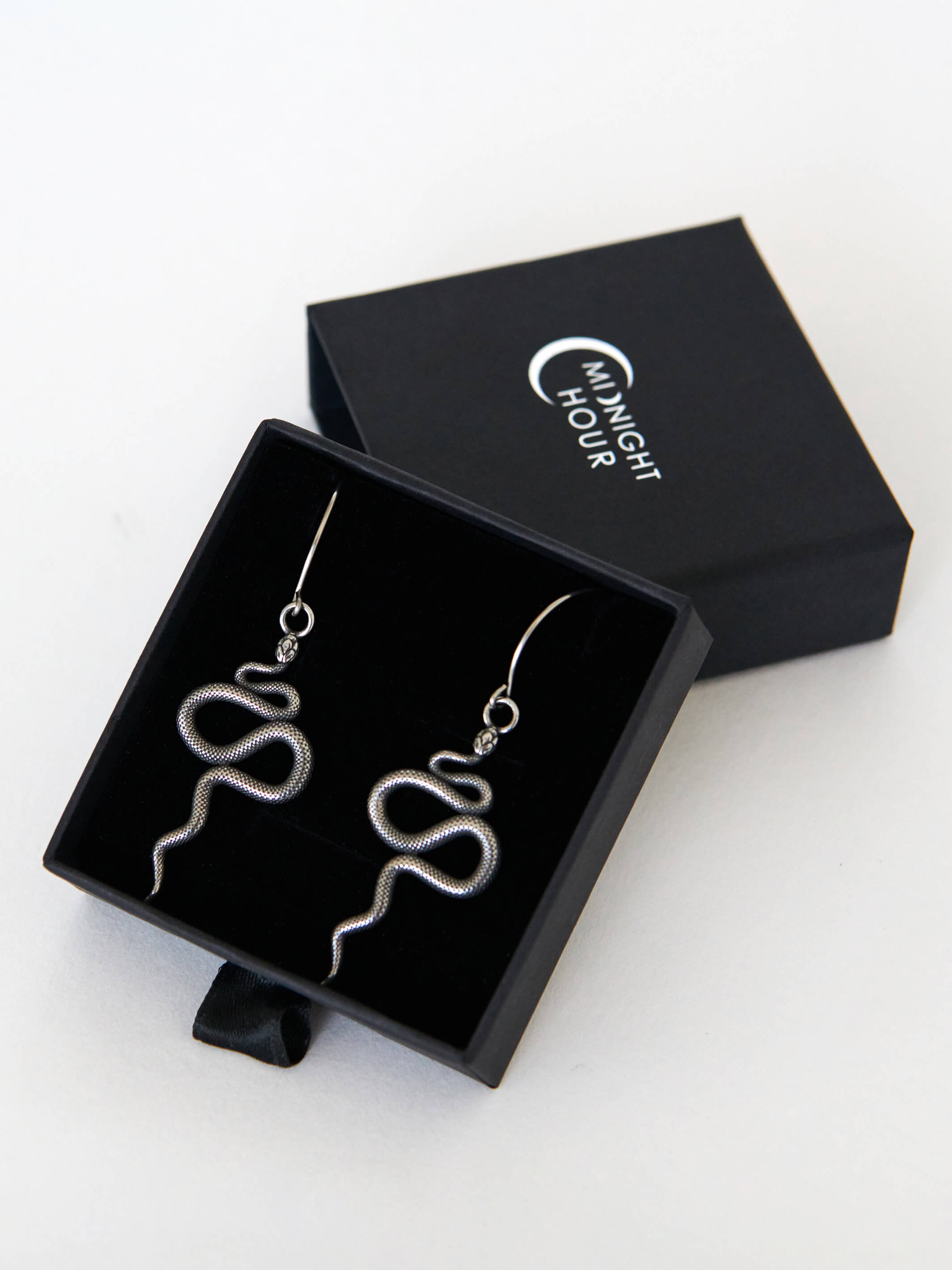 SILVER METAL SNAKE EARRING