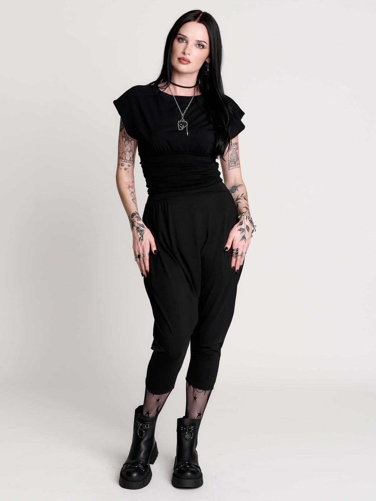 short sleeve top with a softly draped silhouette and a flattering, cinched waist. 