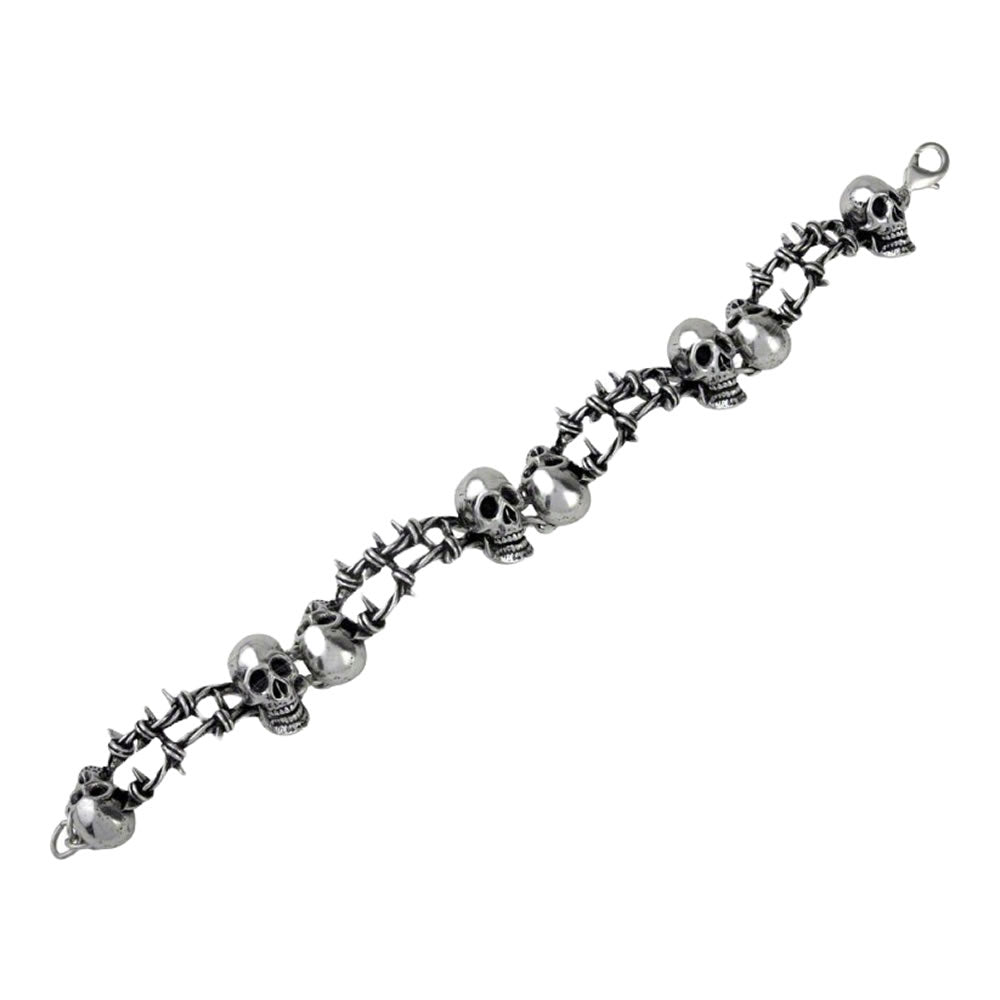 Silver bracelet with skull and barbed wire designs.