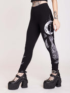 Witchy broom stick graphic on black leggings